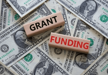 Grant writing and funding development services infographic