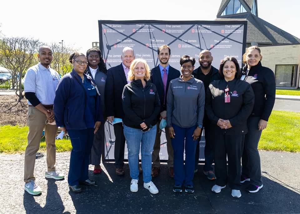 Community partners gathered outside an event location