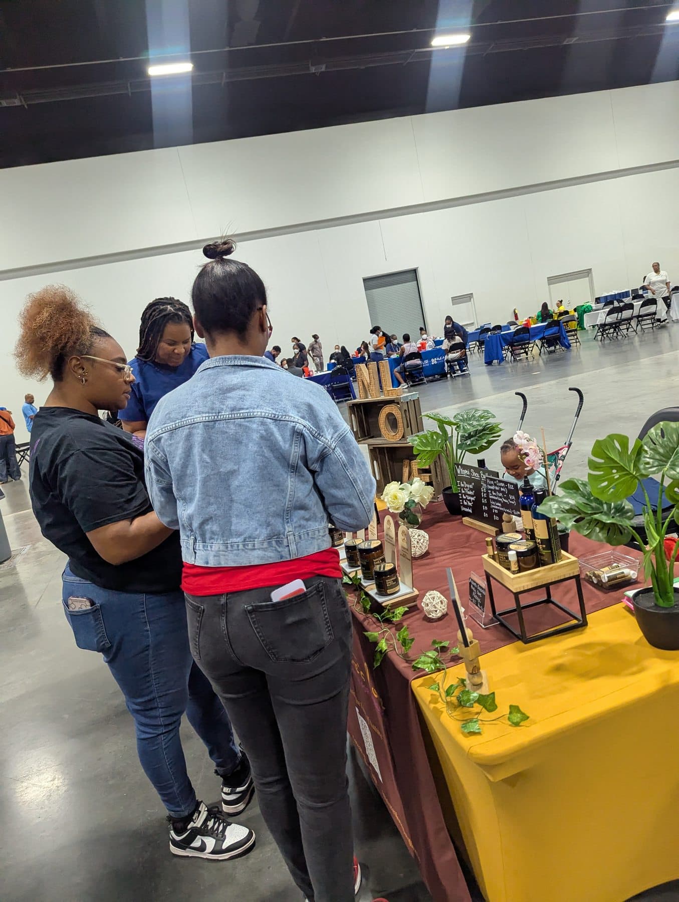 Community members engaging with health resources at a neighborhood event